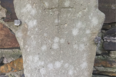This small slab was found in the churchyard in 1906.